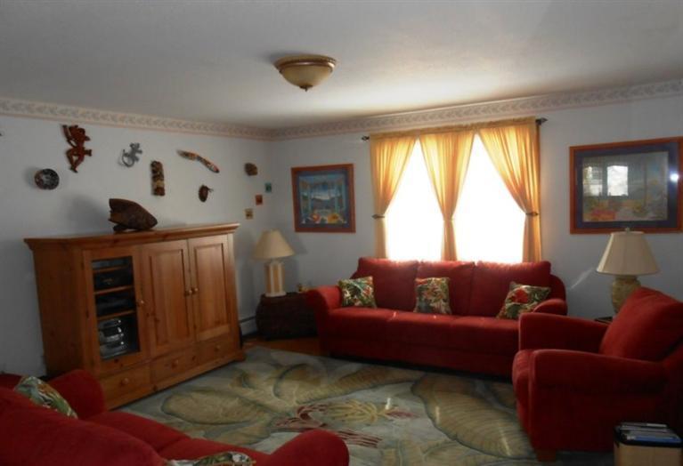 126 James Otis Road Centerville, MA 02632 - Photo 3 of 17 a living room with furniture and a window