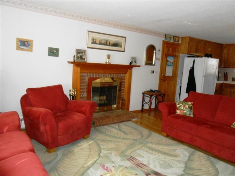 126 James Otis Road Centerville, MA 02632 - Photo 7 of 17 a living room with furniture and a fireplace