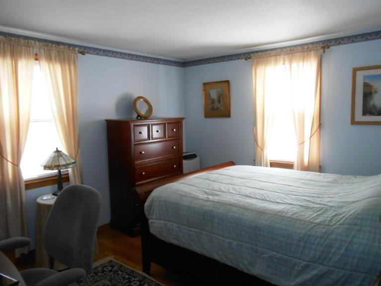 126 James Otis Road Centerville, MA 02632 - Photo 10 of 17 a bedroom with a bed and a window