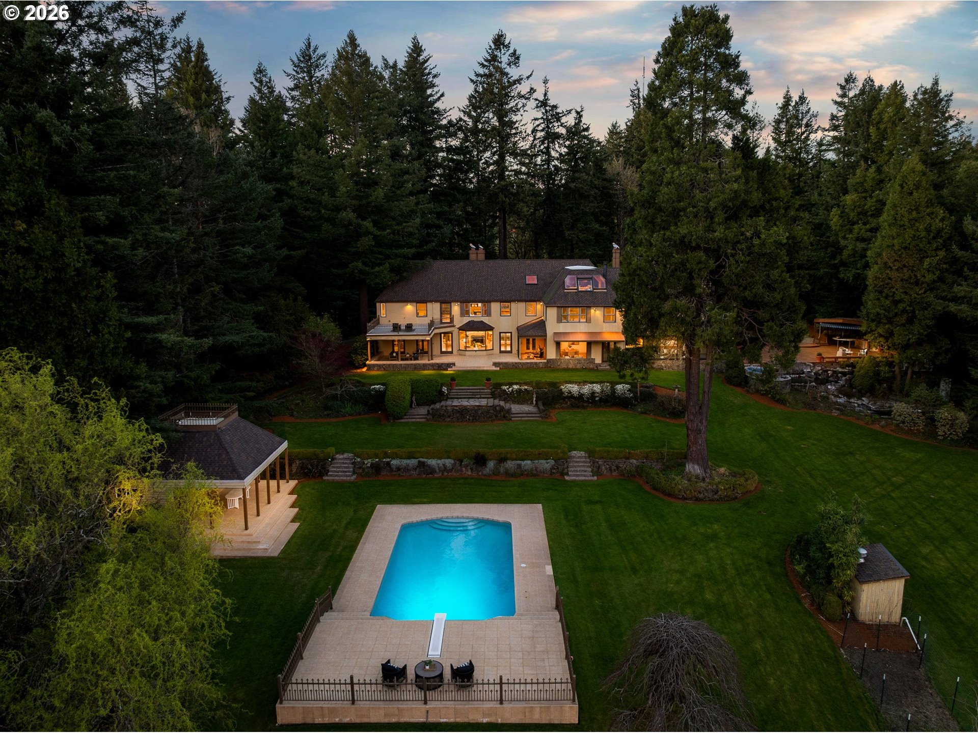 aerial view of a house with garden