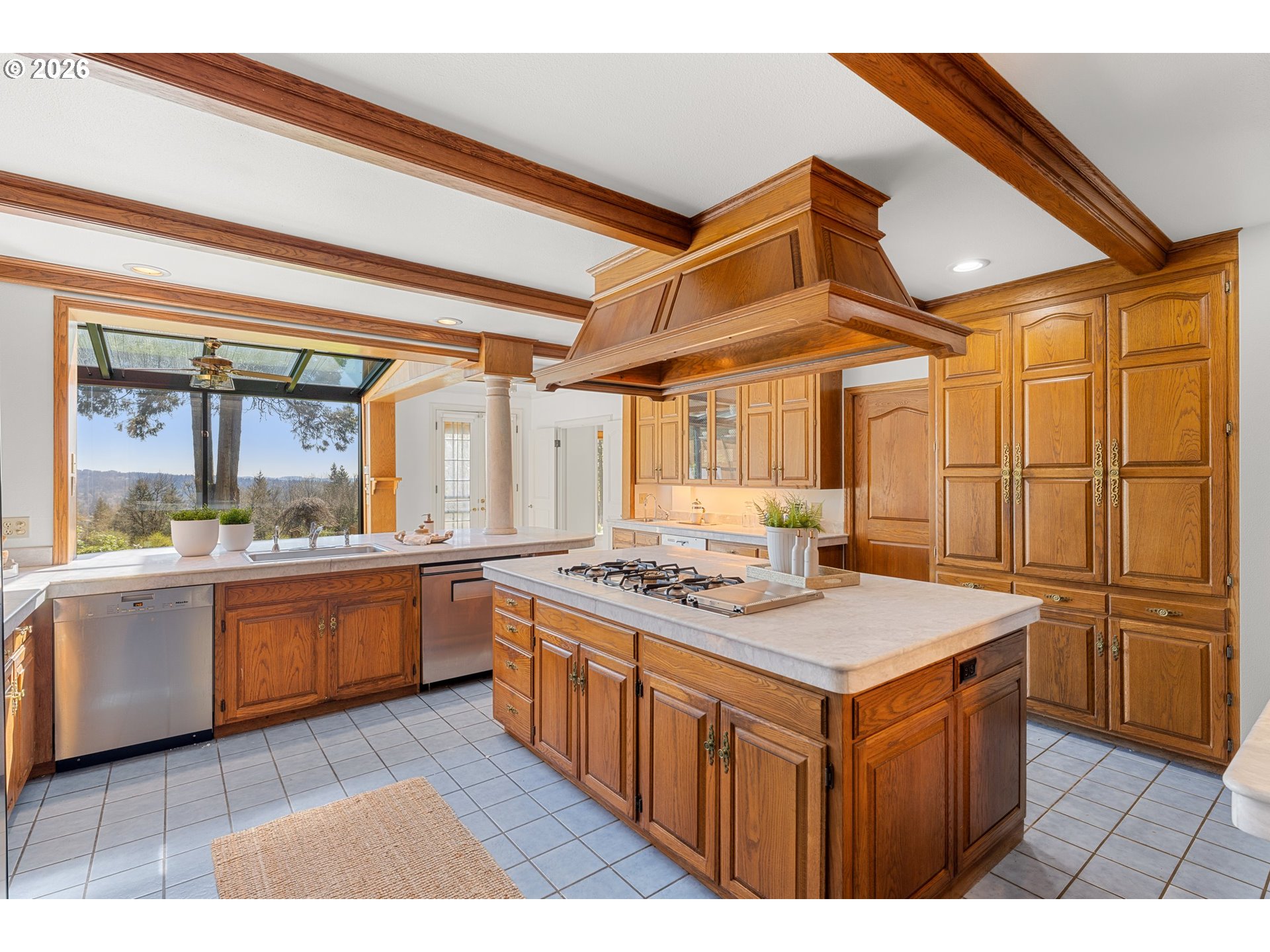 2732 Southwest Scholls Ferry Road Portland, OR 97221 - Photo 16 of 46 a kitchen with a stove a refrigerator a sink and dishwasher