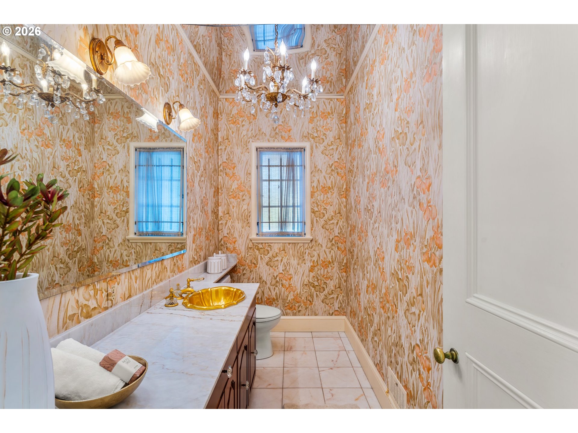 2732 Southwest Scholls Ferry Road Portland, OR 97221 - Photo 17 of 46 a bathroom with a granite countertop sink a mirror a bathtub and shower