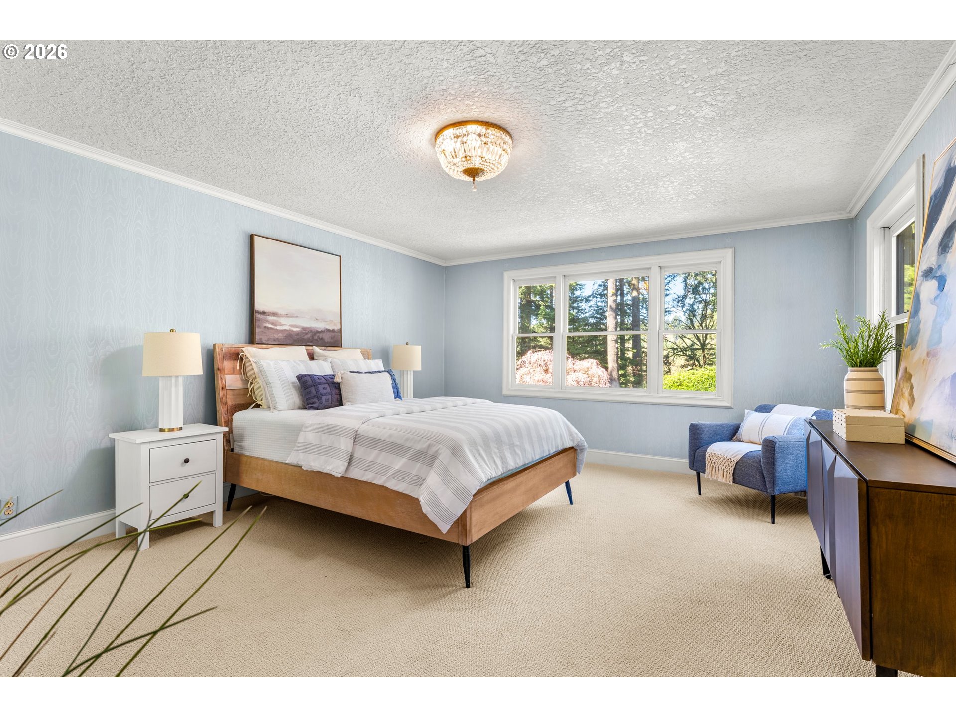 2732 Southwest Scholls Ferry Road Portland, OR 97221 - Photo 28 of 46 a bedroom with a bed and a window