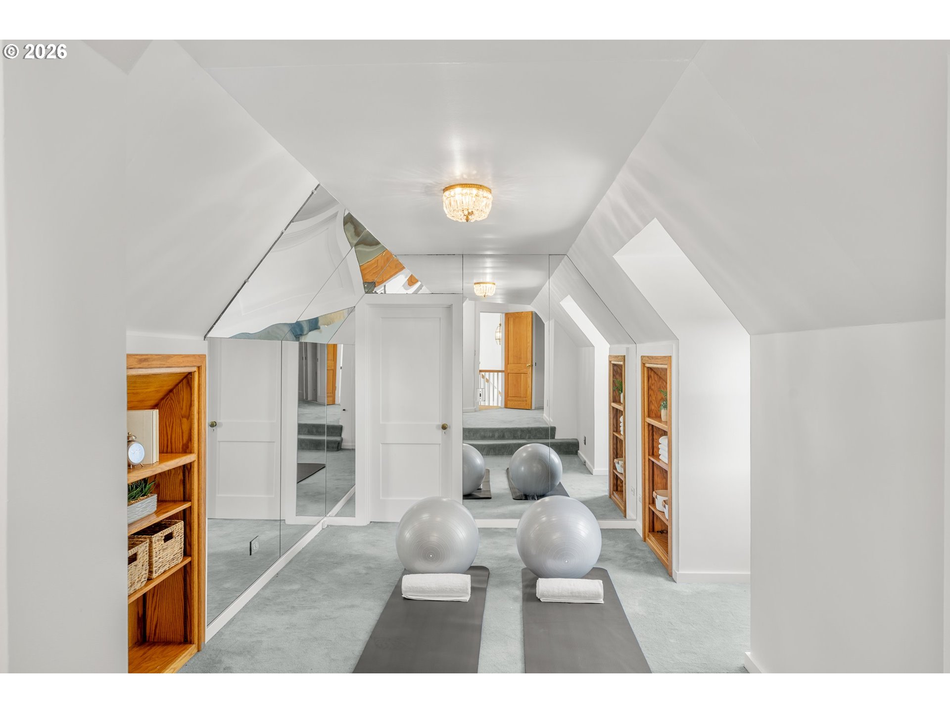2732 Southwest Scholls Ferry Road Portland, OR 97221 - Photo 29 of 46 a living room with furniture and a book shelf