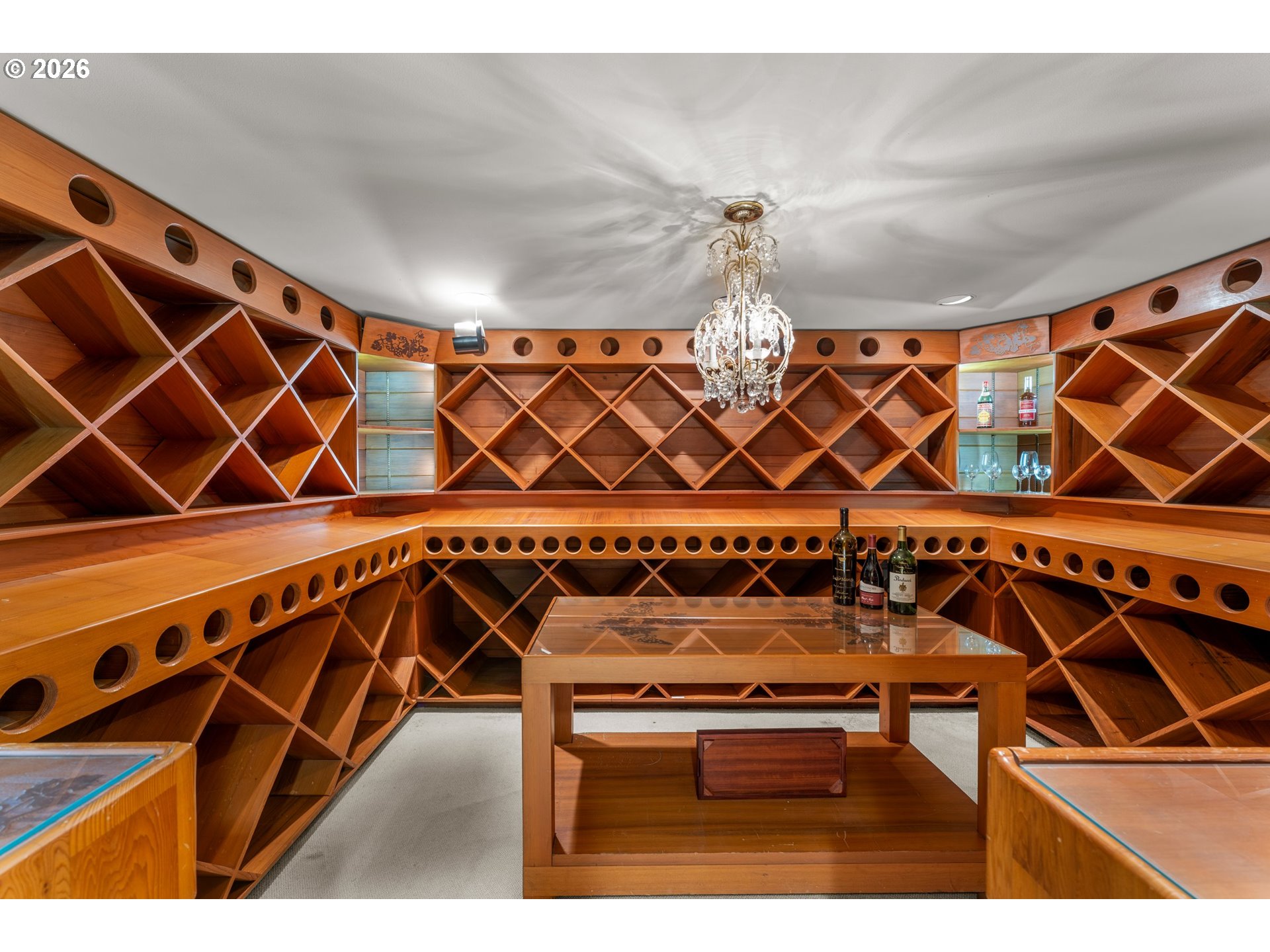 2732 Southwest Scholls Ferry Road Portland, OR 97221 - Photo 33 of 46 a utility room with gym equipment and wooden floors