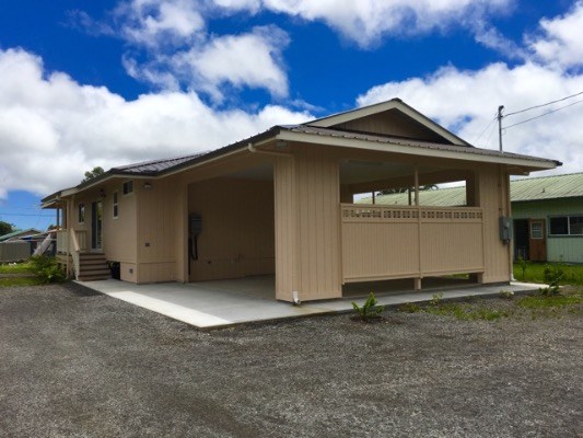 18-7892 Peleke Road Mountain View, HI 96771 - Photo 1 of 16 a view of a house with a yard