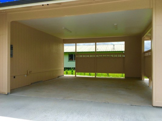 18-7892 Peleke Road Mountain View, HI 96771 - Photo 4 of 16 a view of an empty room with a window