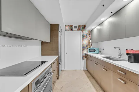 $575,000 | 6917 Collins Avenue, Unit 404, Miami Beach, FL 33141