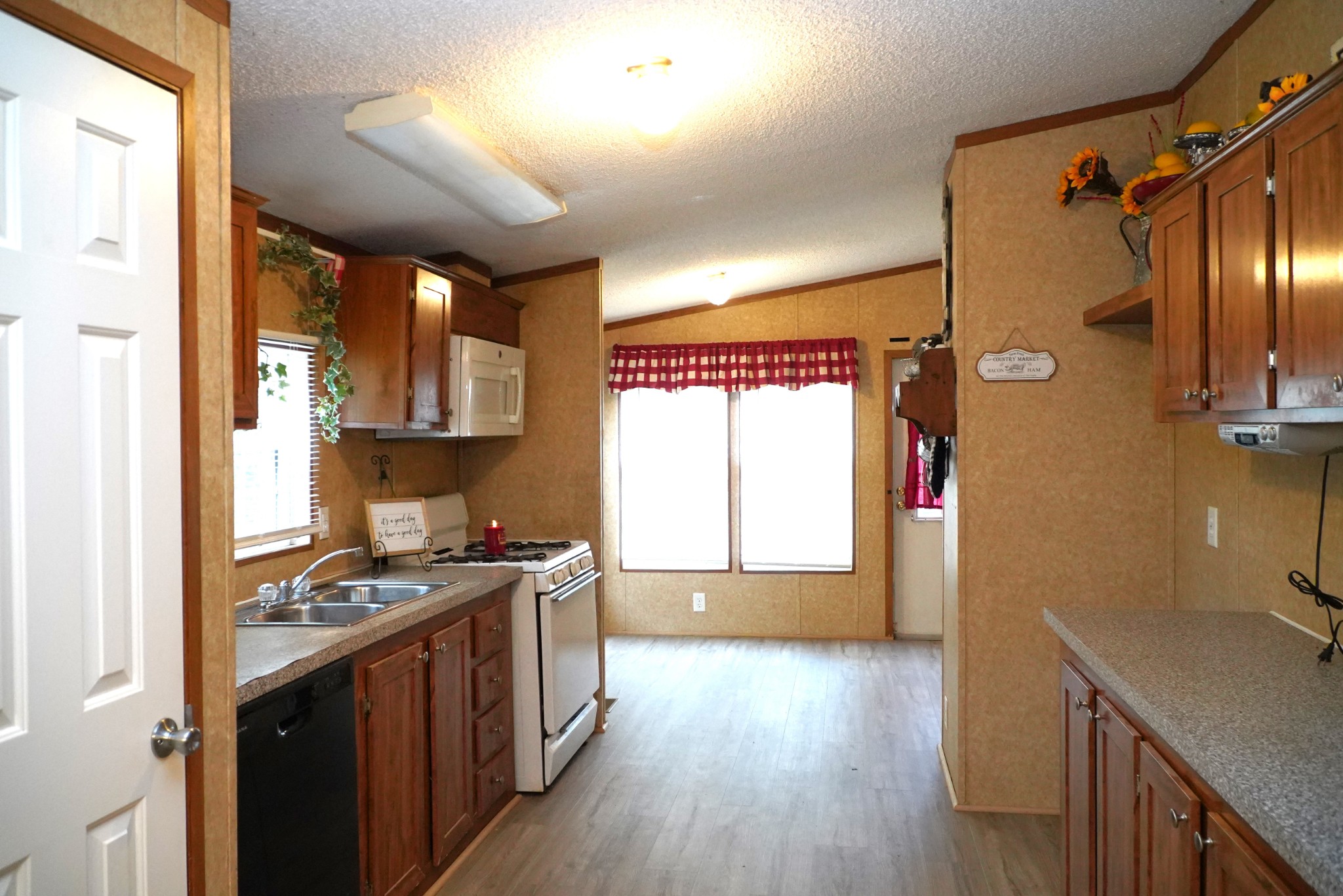 237 Red Oak Road Petersburg, TN 37144 - Photo 11 of 57 a kitchen with stainless steel appliances granite countertop a stove and a refrigerator