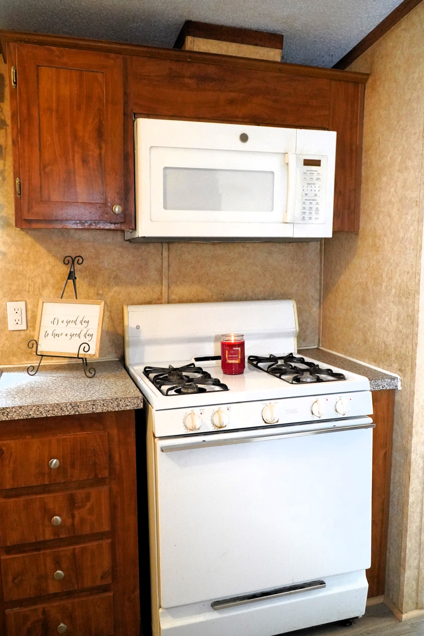237 Red Oak Road Petersburg, TN 37144 - Photo 13 of 57 a stove top oven sitting inside of a kitchen