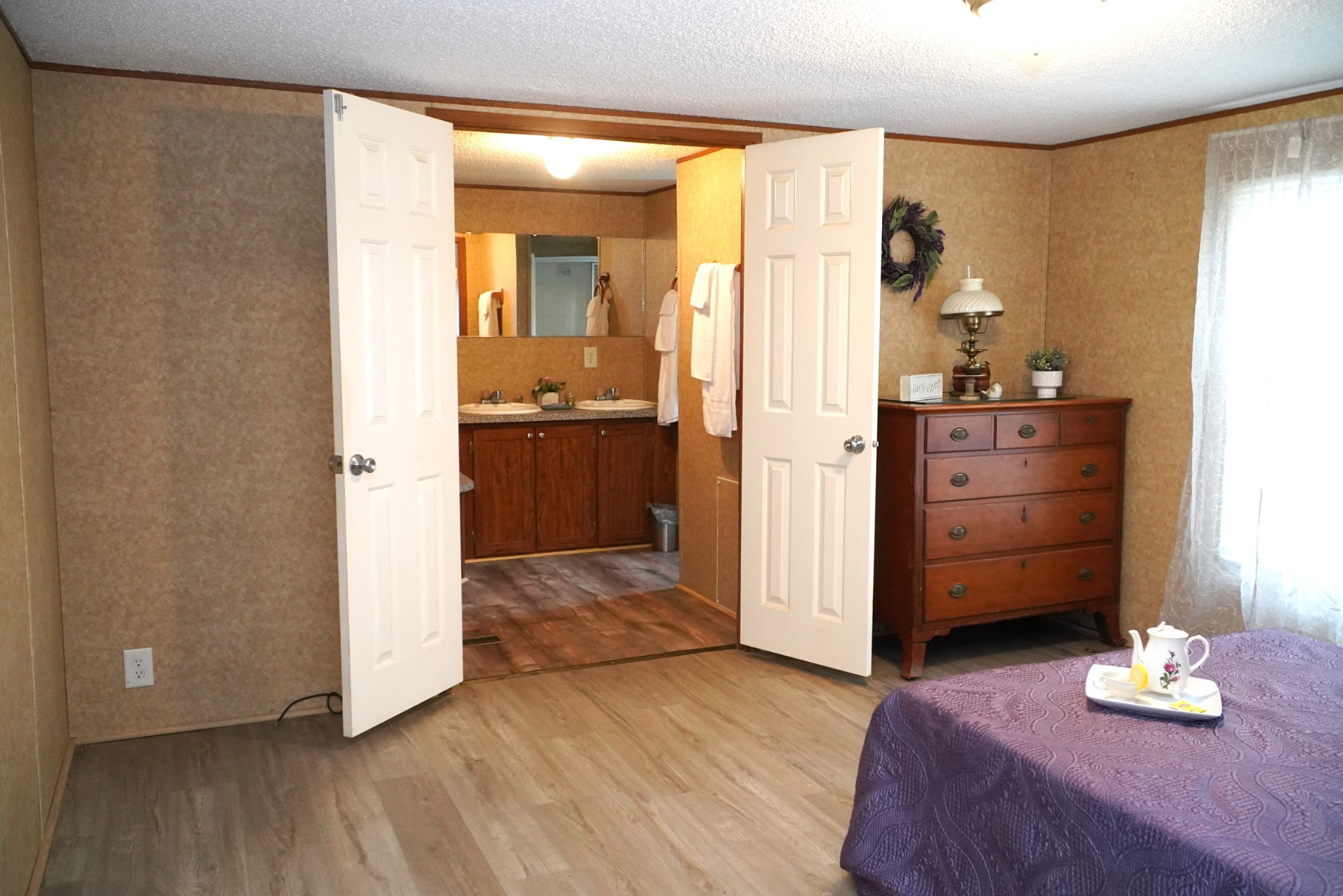 237 Red Oak Road Petersburg, TN 37144 - Photo 18 of 57 a bedroom with a bed and a dresser in it
