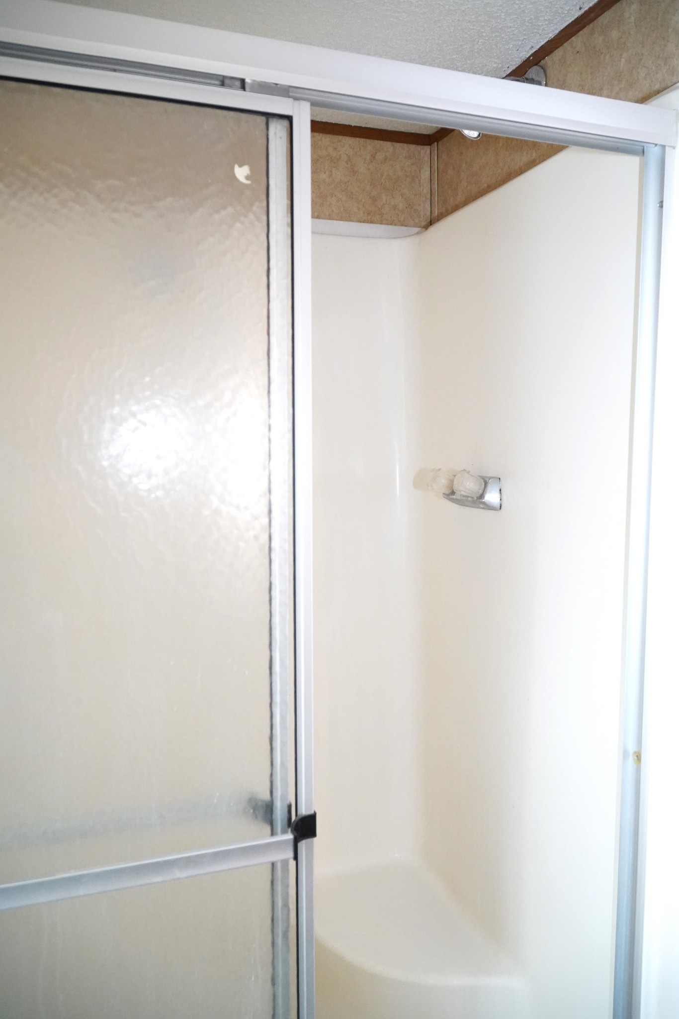 237 Red Oak Road Petersburg, TN 37144 - Photo 22 of 57 a bathroom with a glass shower door
