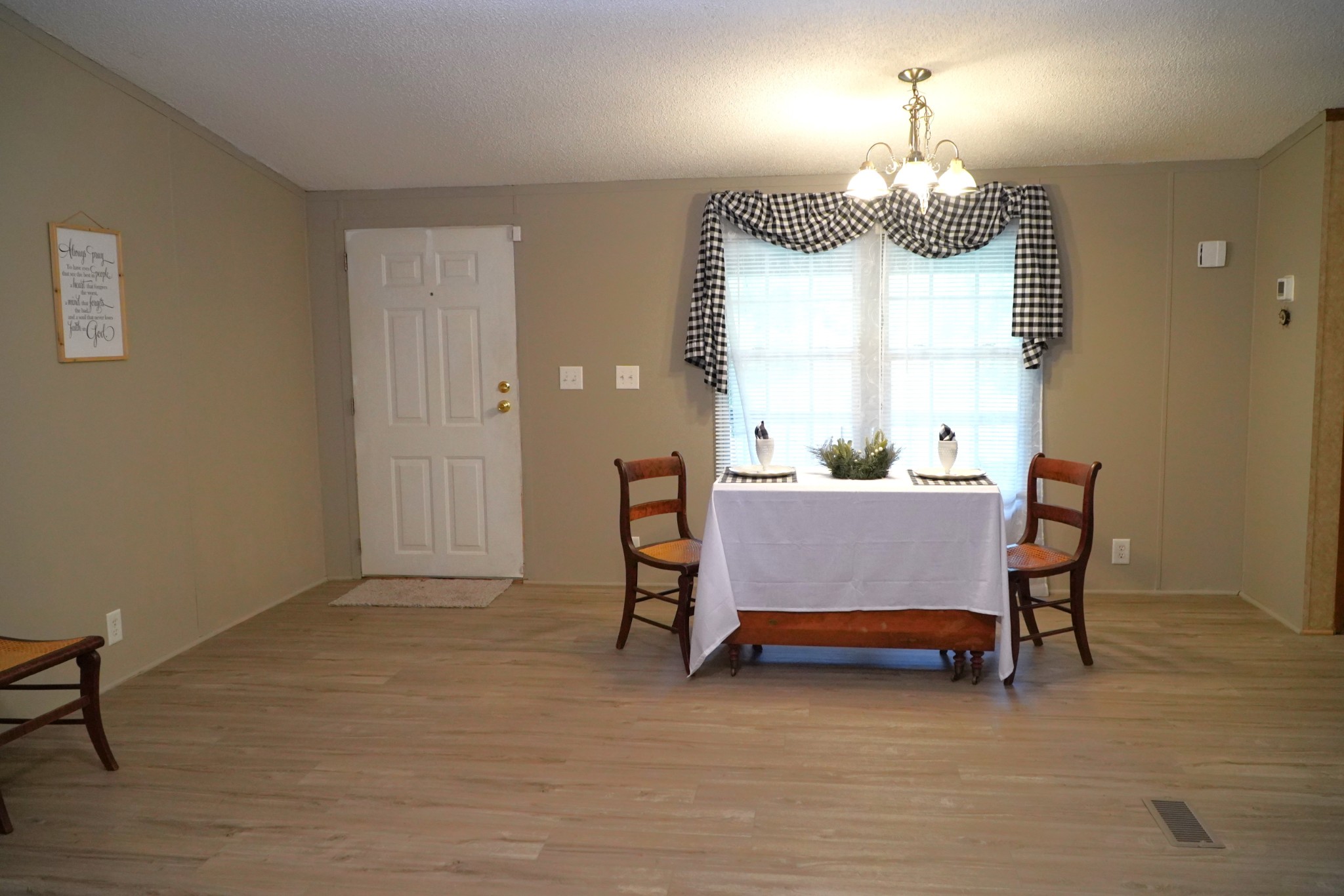 237 Red Oak Road Petersburg, TN 37144 - Photo 10 of 57 a view of a dining room with furniture window and wooden floor