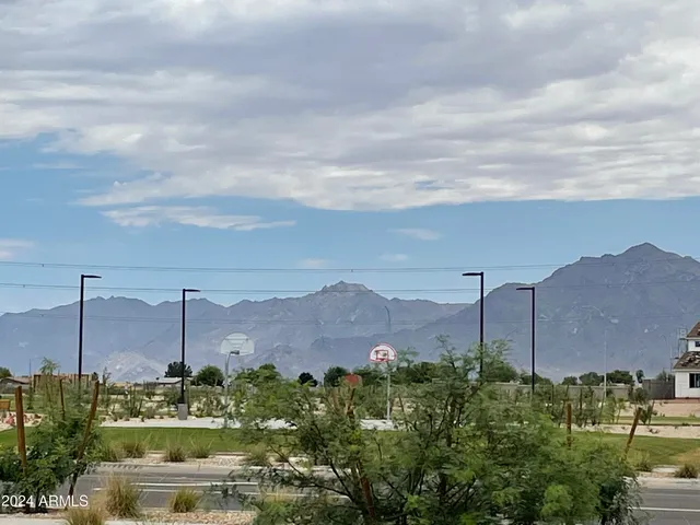 a view of a city with a building in the background