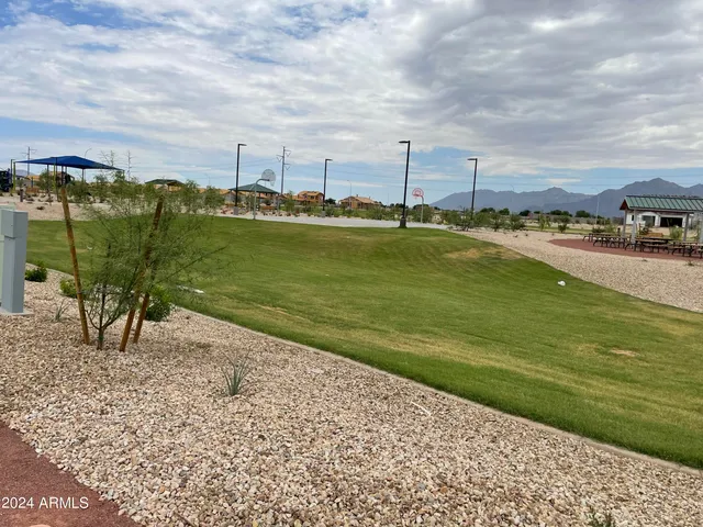 a view of a lake with a big yard