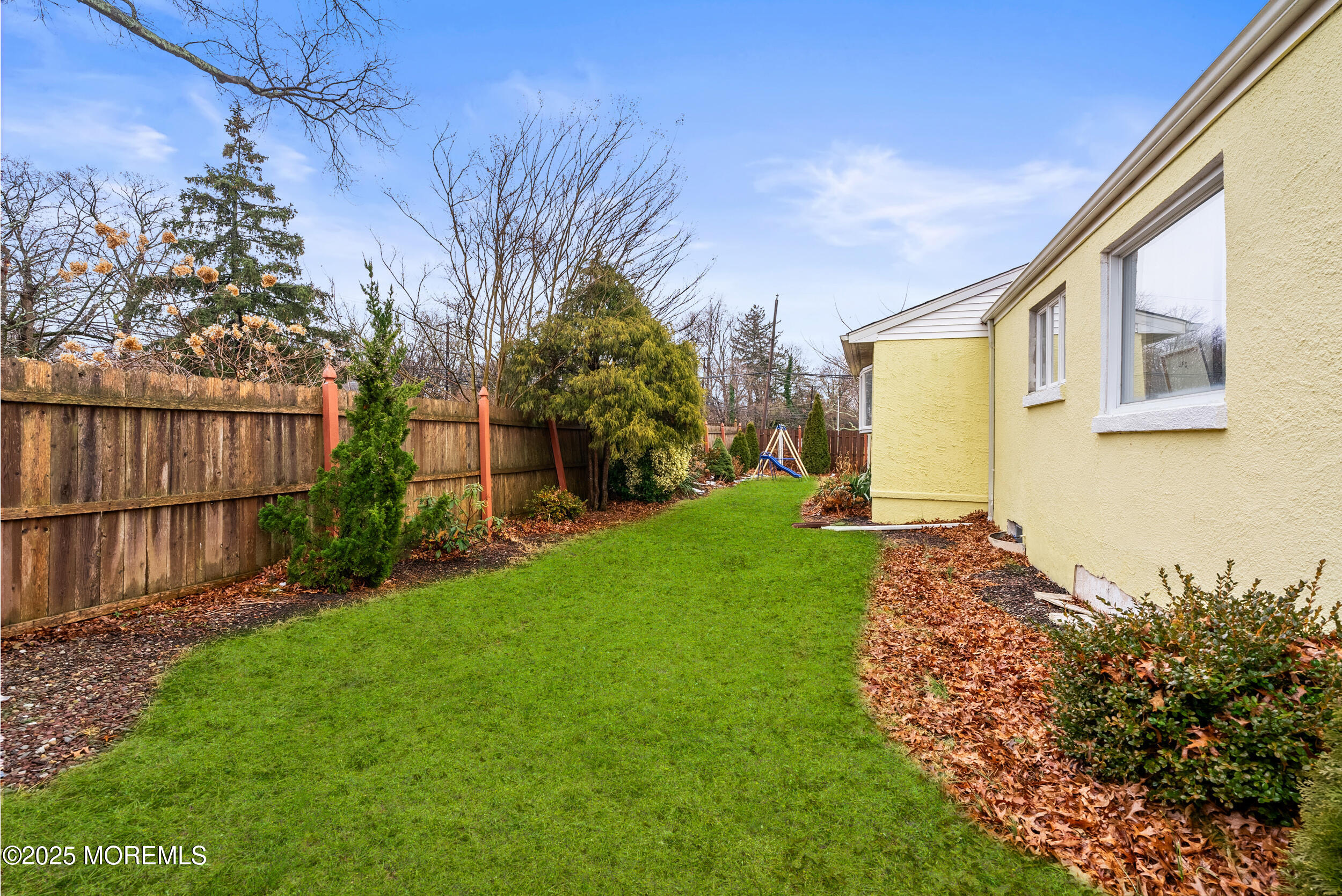 128 Beechwood Avenue West Long Branch, NJ 07764 - Photo 23 of 29 a backyard of a house with lots of green space