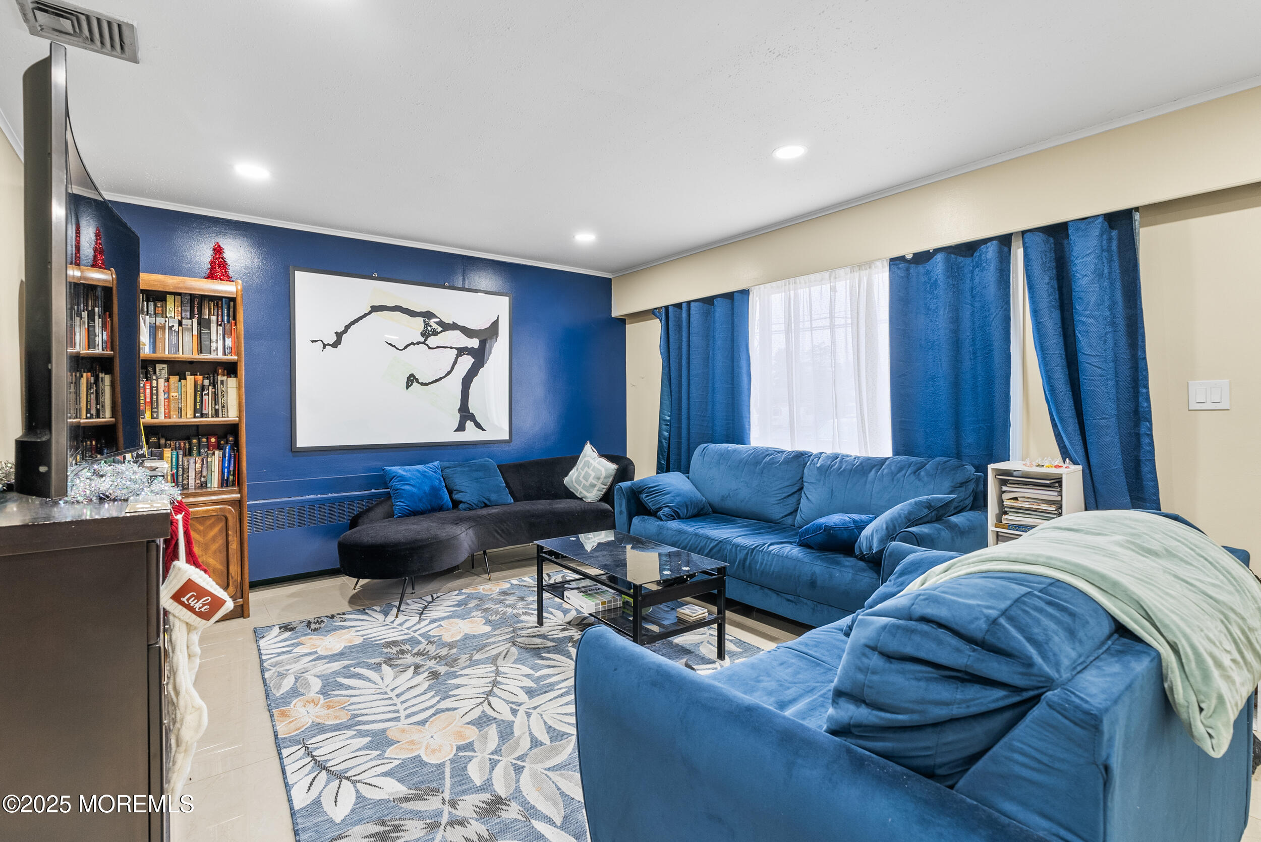 128 Beechwood Avenue West Long Branch, NJ 07764 - Photo 3 of 29 a living room with furniture and large window