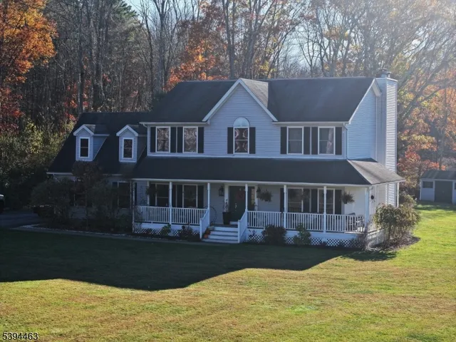 a front view of a house with swimming pool
