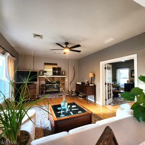 a bathroom with a tub sink and view