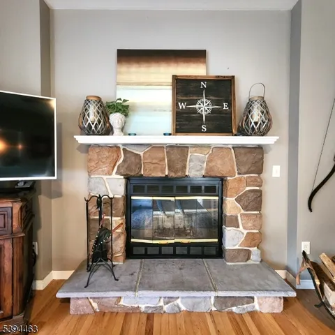 a view of a patio with a table chairs and a yard