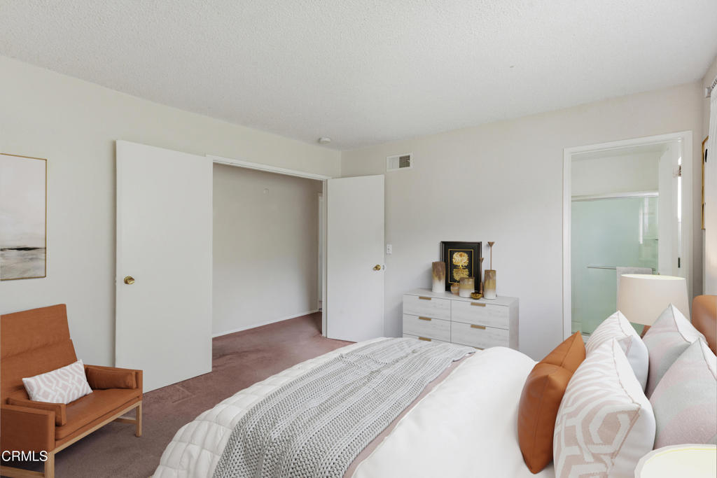 29443 Abelia Road Canyon Country, CA 91387 - Photo 12 of 31 a bedroom with a bed and chair