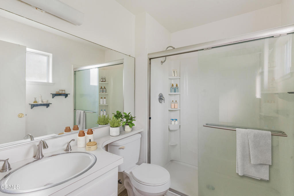 29443 Abelia Road Canyon Country, CA 91387 - Photo 14 of 31 a bathroom with a sink toilet and shower