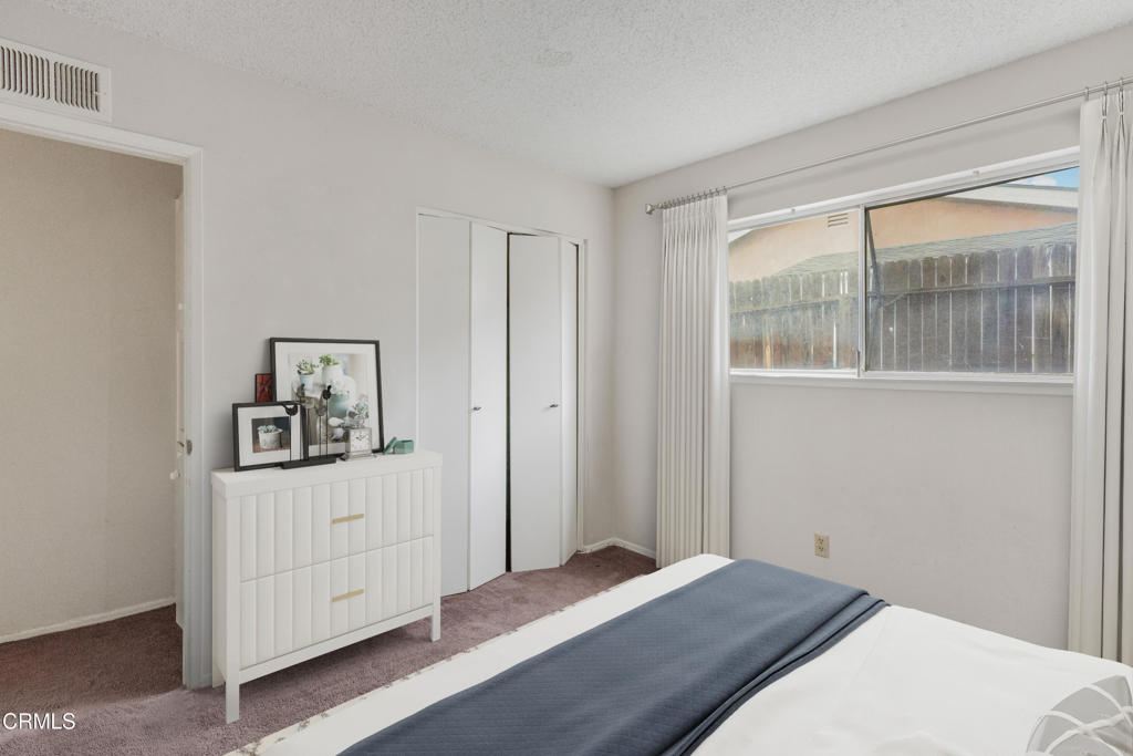 29443 Abelia Road Canyon Country, CA 91387 - Photo 16 of 31 a bedroom with a bed and a window