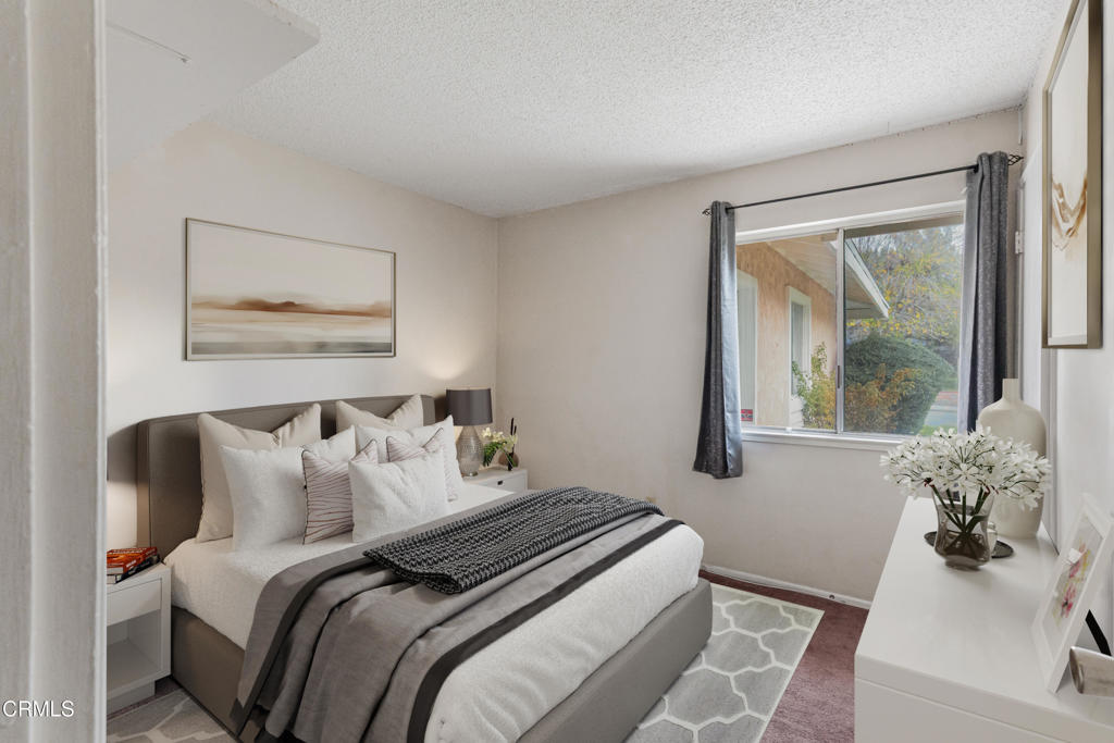 29443 Abelia Road Canyon Country, CA 91387 - Photo 18 of 31 a bedroom with bed and a window
