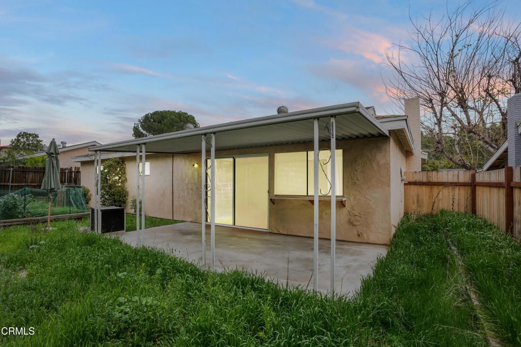29443 Abelia Road Canyon Country, CA 91387 - Photo 22 of 31 a view of an house with backyard and floor to ceiling window