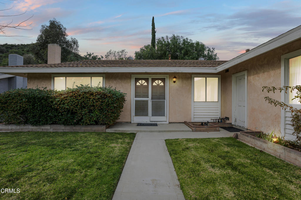 29443 Abelia Road Canyon Country, CA 91387 - Photo 3 of 31 front view of a house with a yard
