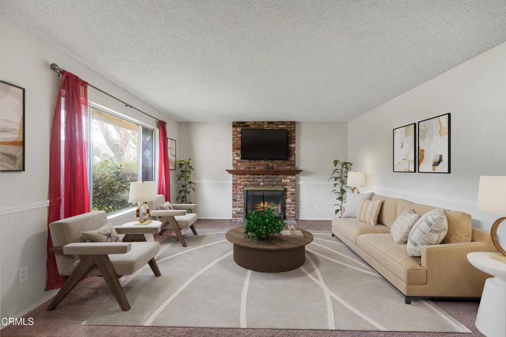 29443 Abelia Road Canyon Country, CA 91387 - Photo 5 of 31 a living room with furniture fireplace and a large window