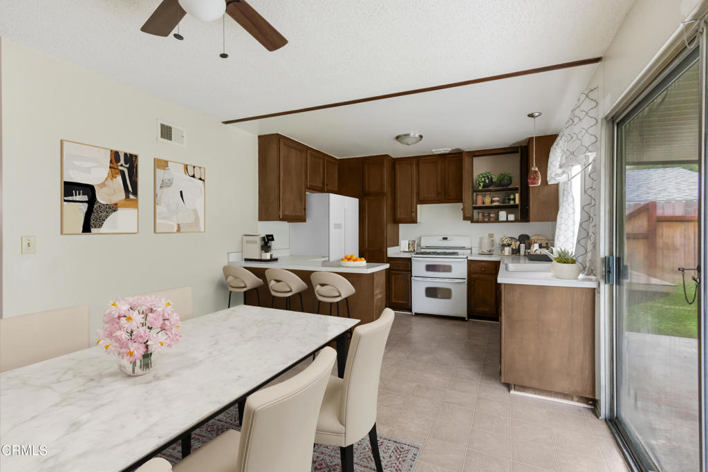 29443 Abelia Road Canyon Country, CA 91387 - Photo 8 of 31 a kitchen with a sink cabinets and wooden floor