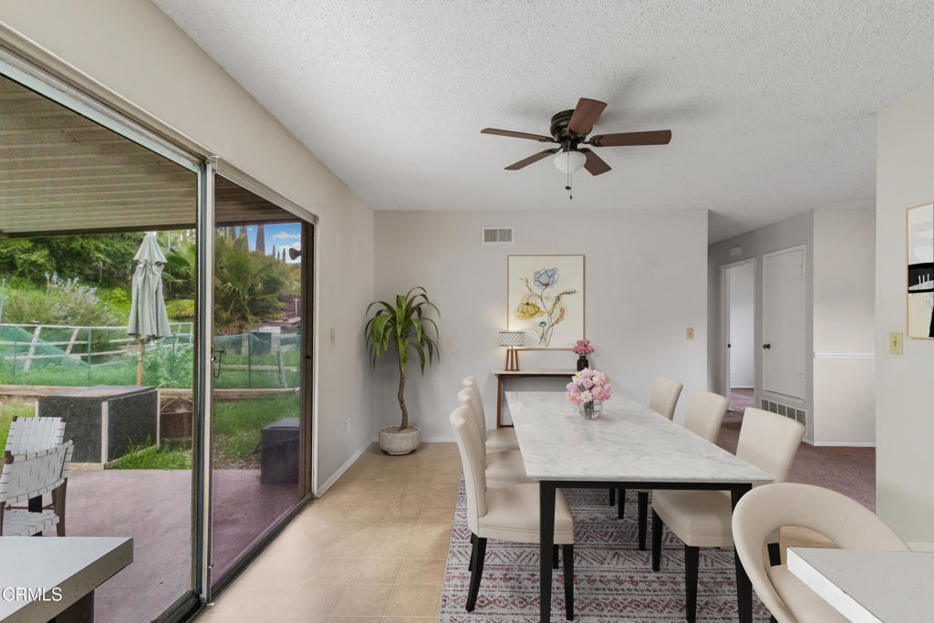 29443 Abelia Road Canyon Country, CA 91387 - Photo 9 of 31 a view of a dining room with furniture window and outside view