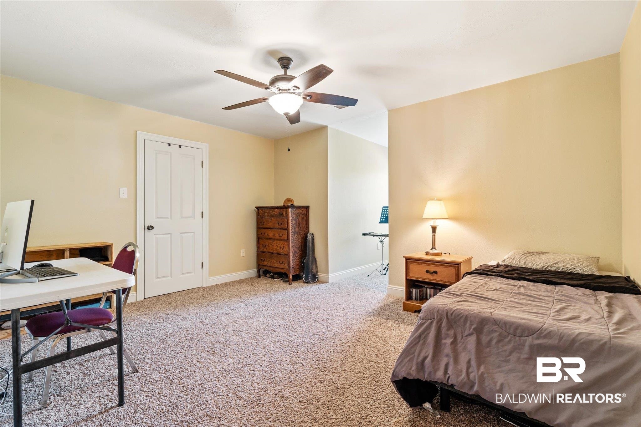 72 Limestone Drive Jackson, AL 36545 - Photo 24 of 38 Bedroom featuring ceiling fan and carpet floors