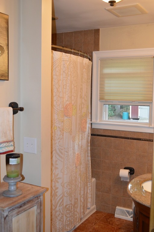 215 Hudson Road Sudbury, MA 01776 - Photo 11 of 18 a bathroom with a shower and a sink