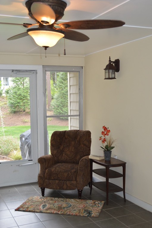 215 Hudson Road Sudbury, MA 01776 - Photo 5 of 18 a living room with furniture and a window