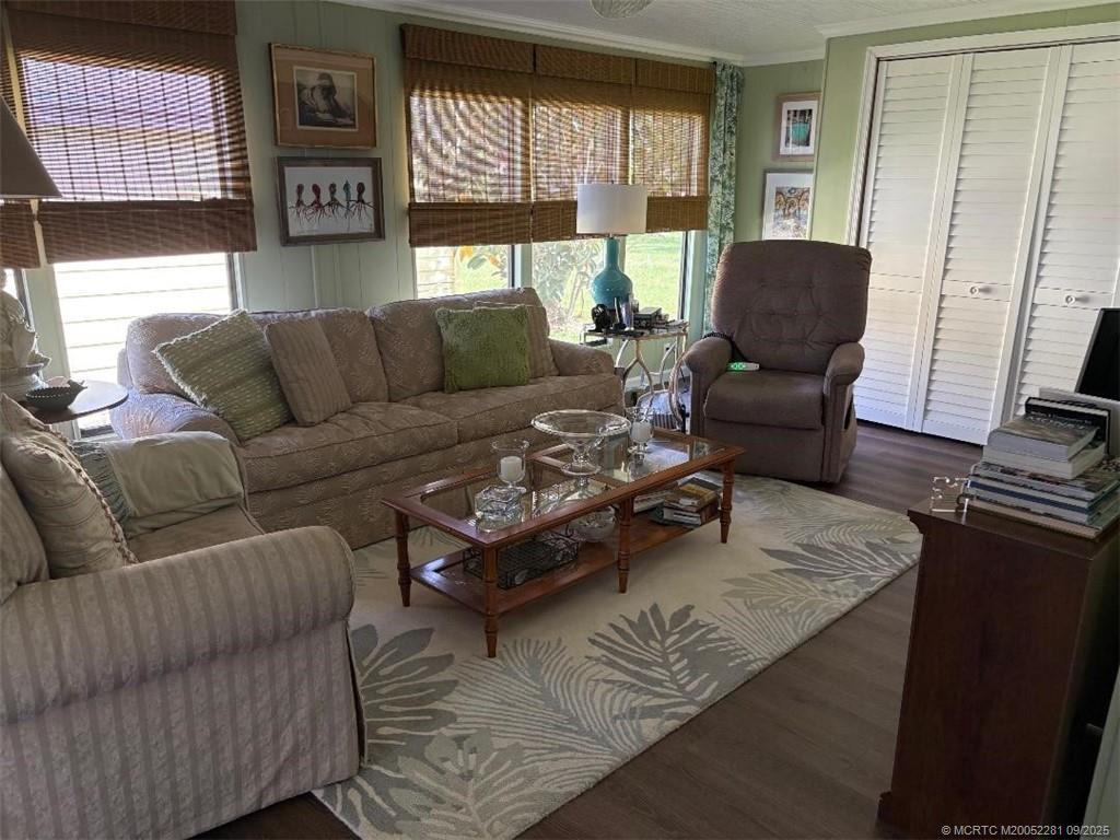 2686 Southwest Monarch Trail Stuart, FL 34997 - Photo 5 of 15 a living room with furniture and a window