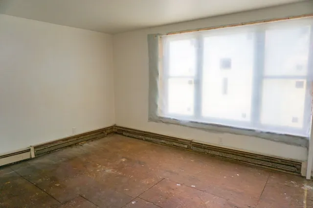 a view of a room with windows