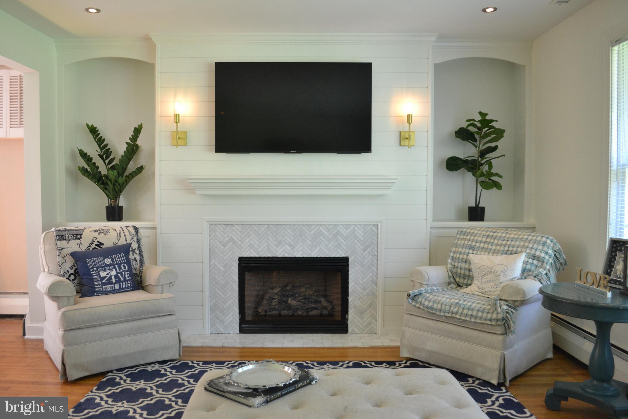 527 West Rolling Road Springfield, PA 19064 - Photo 3 of 24 Gas Fireplace w custom build-in cabinets
