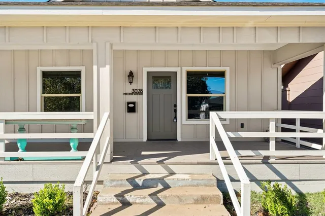 a front view of a house with a garage