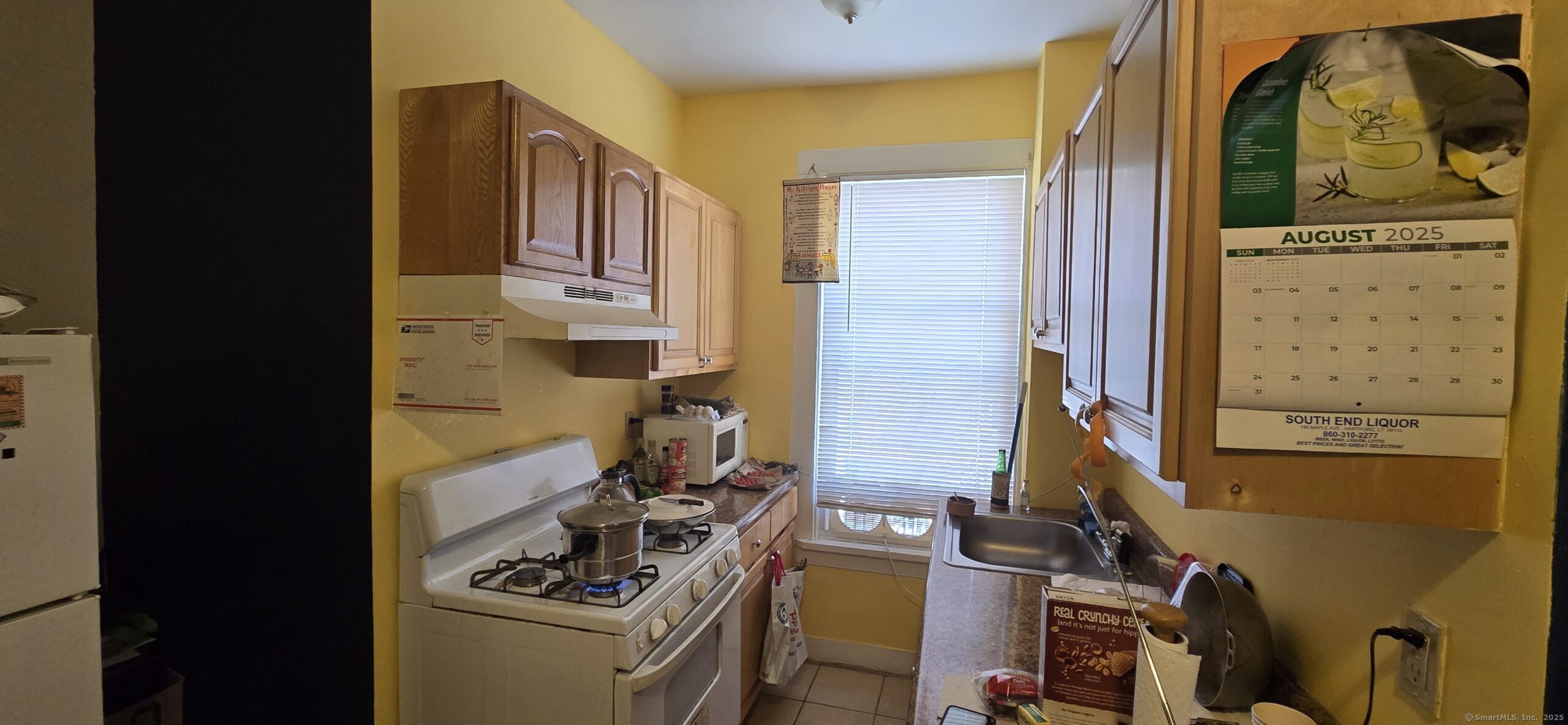 27 Allen Place Hartford, CT 06106 - Photo 3 of 11 a view of kitchen and utility room