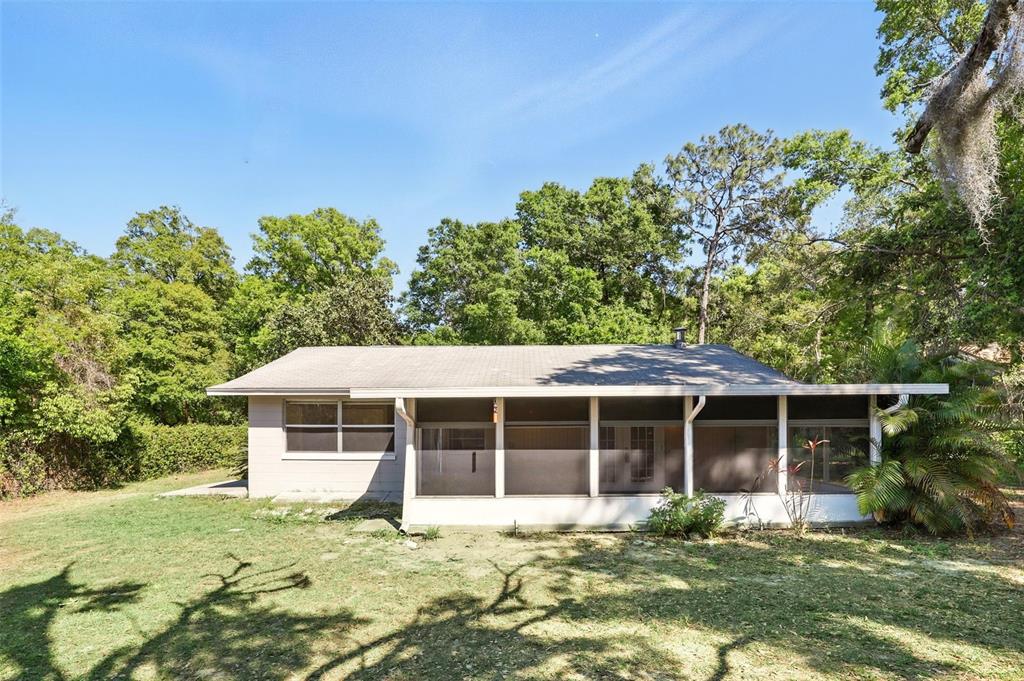 1617 Acacia Road Apopka, FL 32712 - Photo 1 of 30 front view of a house with a yard