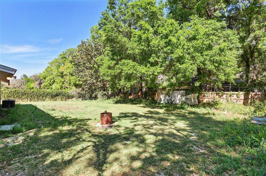 1617 Acacia Road Apopka, FL 32712 - Photo 29 of 30 a view of a lake with a yard
