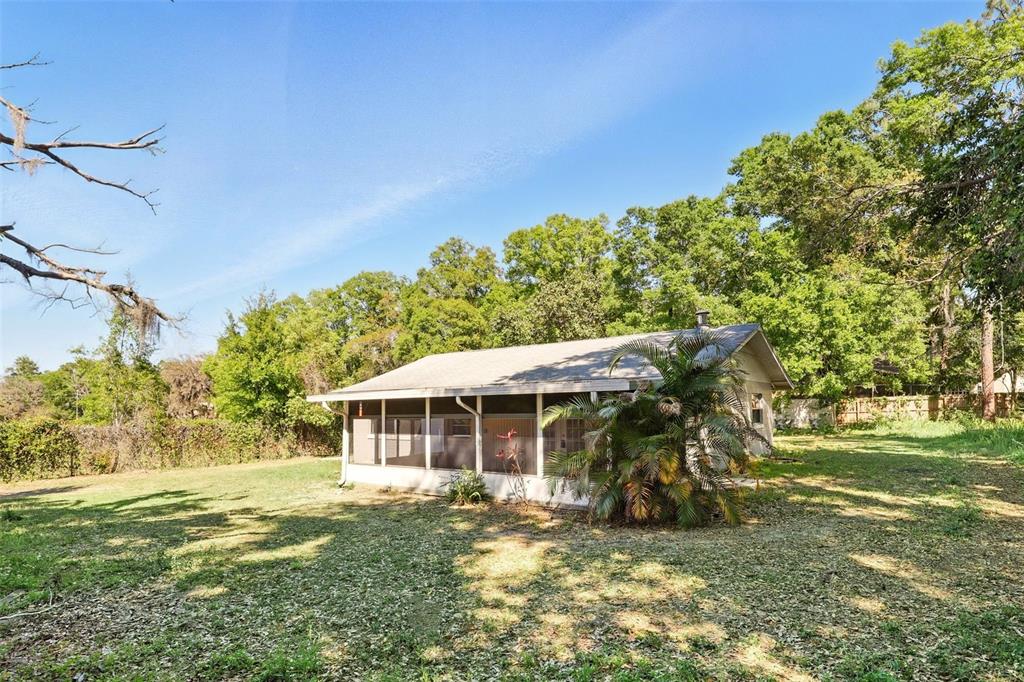 1617 Acacia Road Apopka, FL 32712 - Photo 3 of 30 a view of a house with a yard