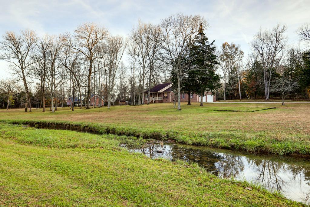 5056 Joe Peay Road Spring Hill, TN 37174 - Photo 3 of 30 a view of a park with large trees