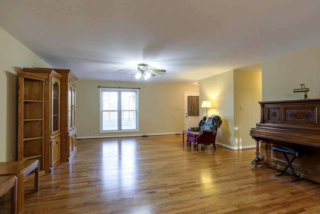 5056 Joe Peay Road Spring Hill, TN 37174 - Photo 10 of 30 a view of a room with furniture and wooden floor