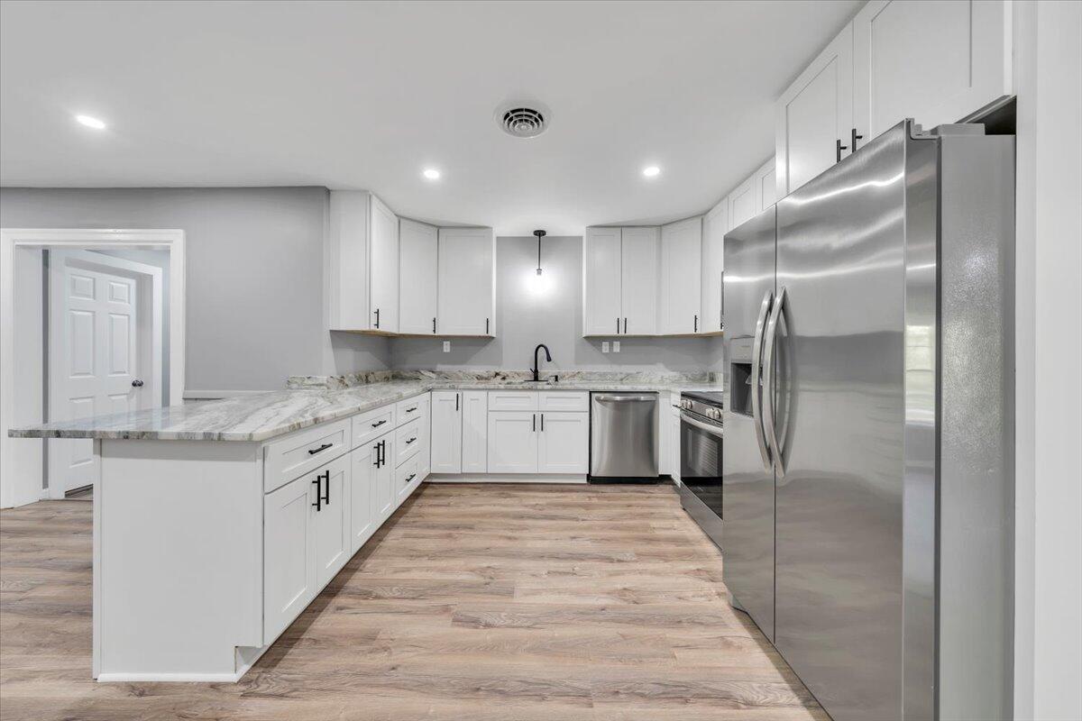 112 Frankie Lane Stuart, VA 24171 - Photo 15 of 57 a large kitchen with stainless steel appliances lots of counter top space and cabinets