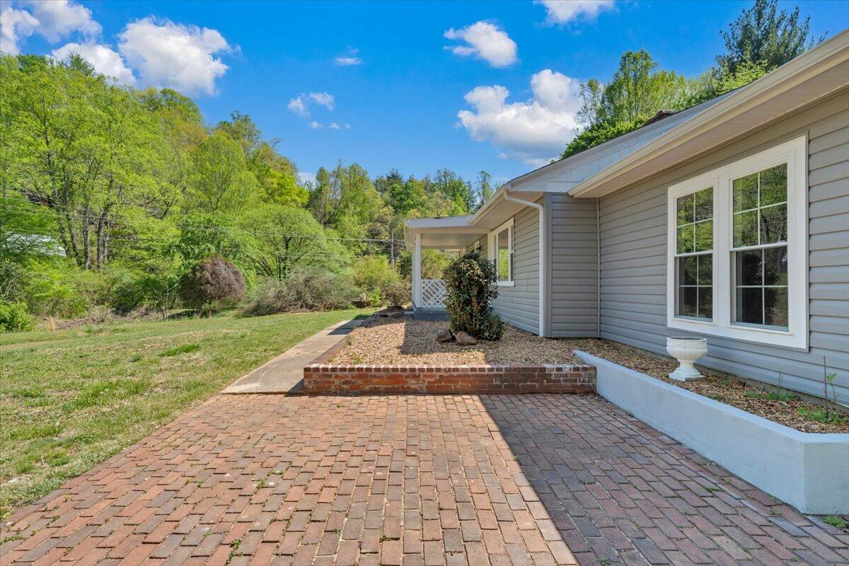 112 Frankie Lane Stuart, VA 24171 - Photo 2 of 57 a view of a house with backyard and garden