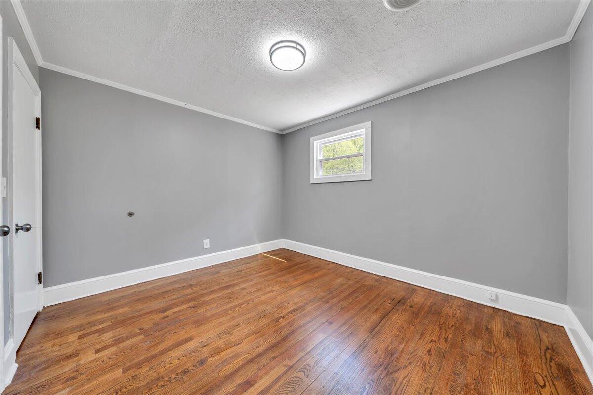112 Frankie Lane Stuart, VA 24171 - Photo 28 of 57 a view of empty room with wooden floor