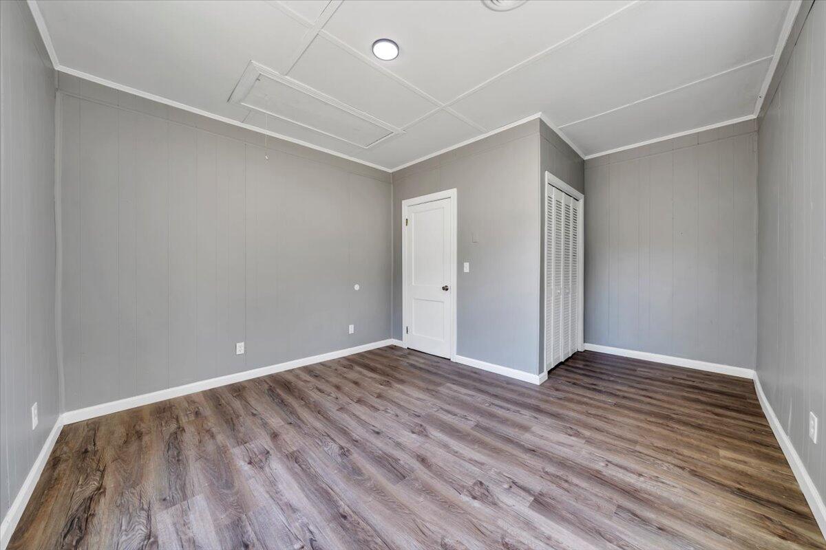 112 Frankie Lane Stuart, VA 24171 - Photo 35 of 57 a view of an empty room with wooden floor